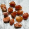 red lace agate tumbled pocket stone - agate dentelle rouge roulée pierre de poche