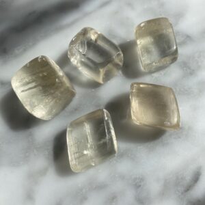 yellow optical calcite tumbled pocket stone